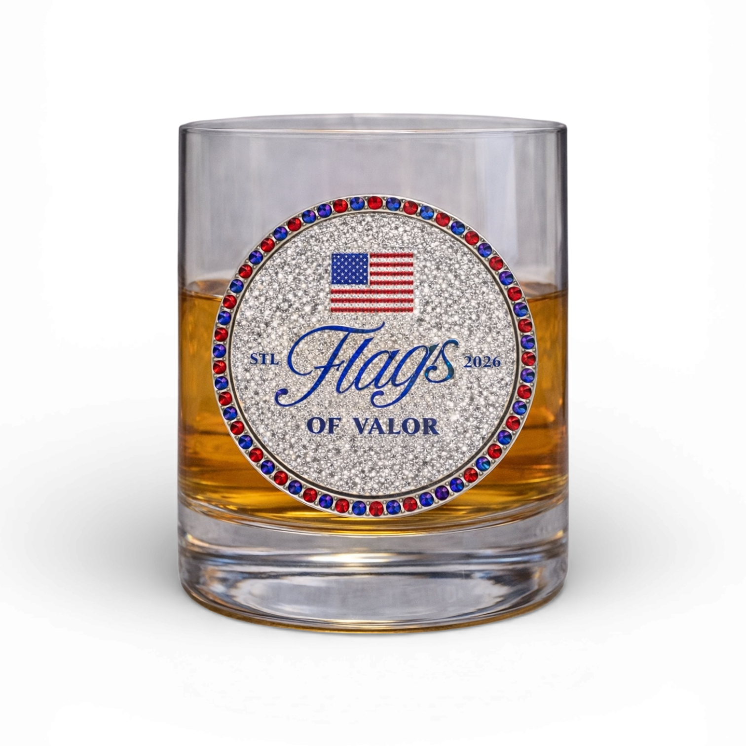 Glass tumbler with 'Flags of Valor' jeweled logo on a jeweled background
