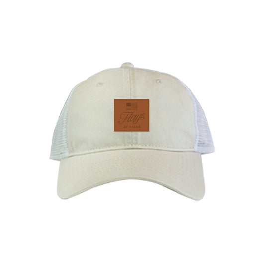 Beige cap with a brown patch on a white background